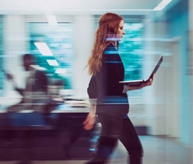 Lady with computer in office