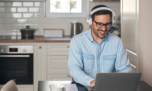 Smiling man using Microsoft Teams Calling