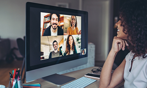 Smiling woman using Microsoft Teams Meetings